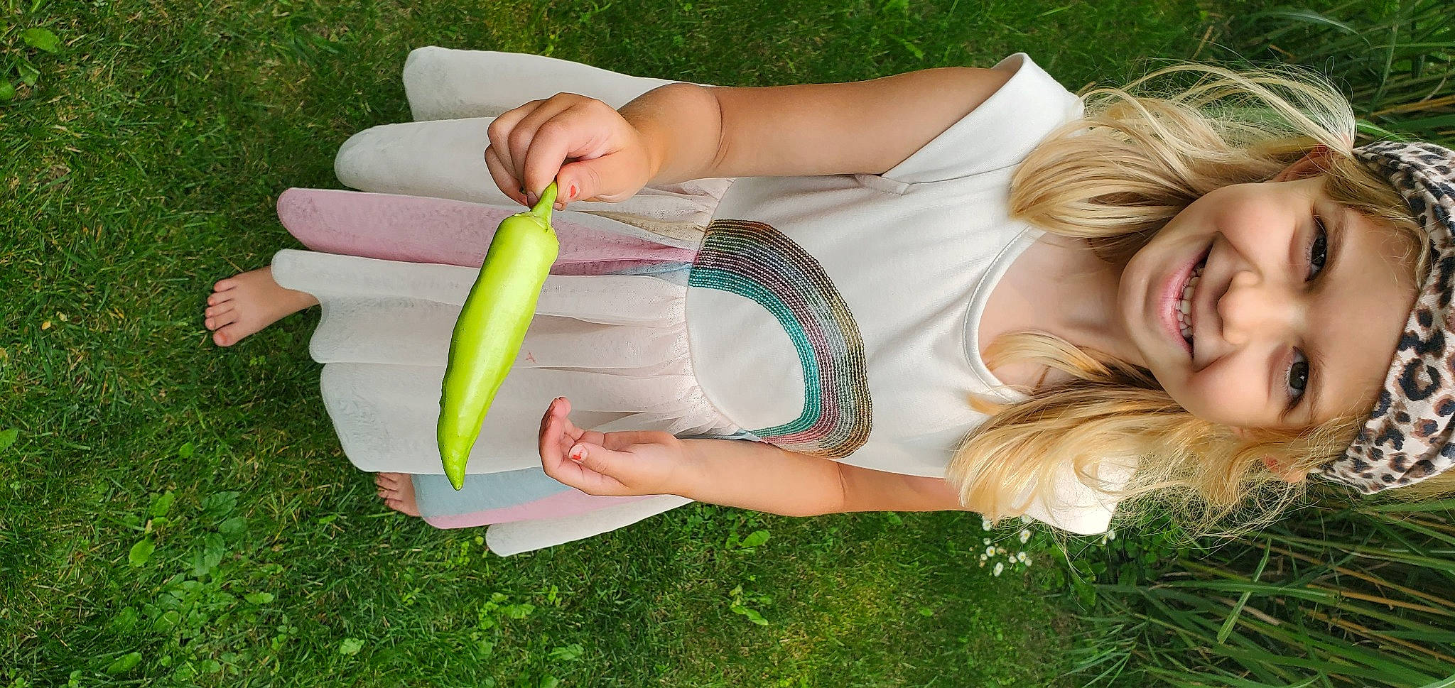 Elaina joined the competition — help win amazing prizes! banana_family, child, fashion_accessory, finger, fish, fun, gesture, grass, hand, happy, headwear, human_leg, joy, lawn, leisure, nail, people_in_nature, person, plant, recreation