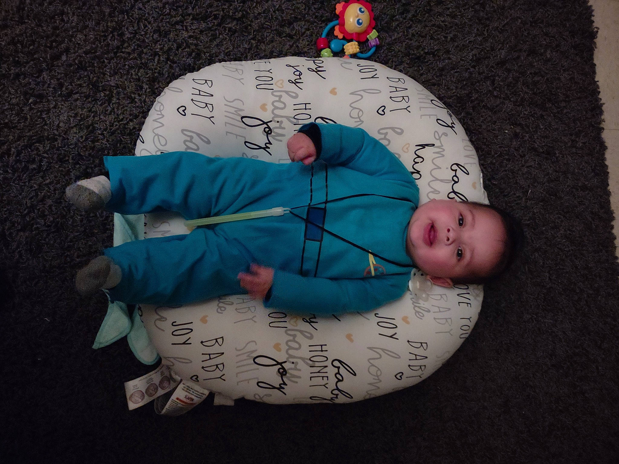 Mazikeen is registered to the contest to win money with this photo: baby, baby_products, baby_sleeping, baby_toddler_clothing, bedtime, child, comfort, fashion_accessory, finger, font, hand, headgear, human_body, linens, nap, pattern, person, sitting, sleeve, textile