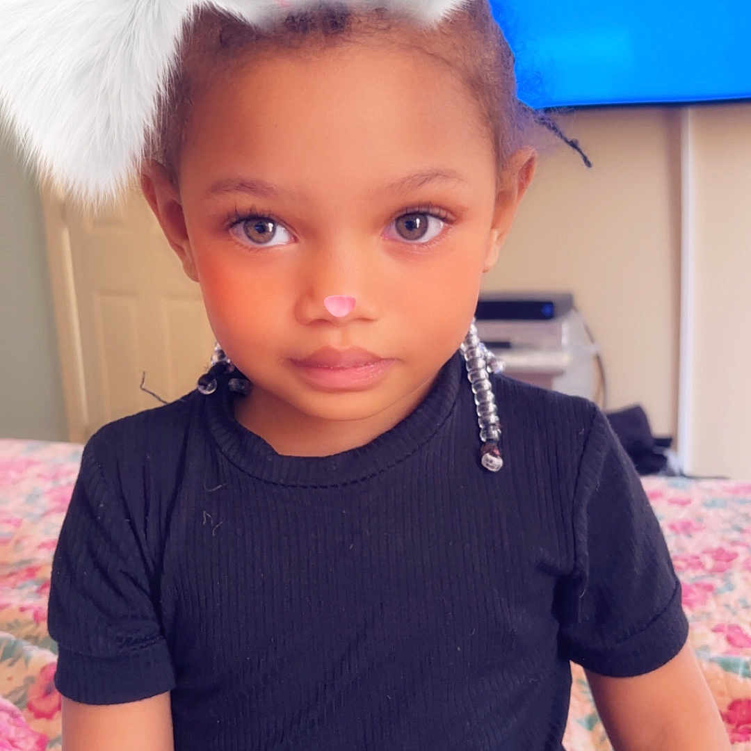 Nevaeh joined the competition — help win amazing prizes! accessories, bed, bedroom, boy, child, clothing, couch, face, furniture, happy, hat, head, indoors, male, person, photography, portrait, room, smile, t_shirt