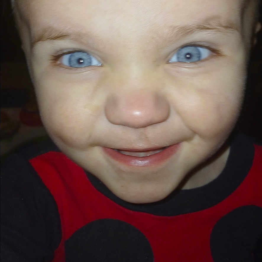Michael is registered to the contest to win money with this photo: child, toddler, portrait, smiling, happy, blue_eyes, blond_hair, face, close_up, indoors, mickey_mouse, shirt, red_clothing, black_clothing, flash_photography, photograph, gallery_screenshot, featured_friday, headshot, cute