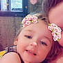 Elizabeth is registered to the contest to win money with this photo: adult, child, closeup, cute, face, family, filter, flower_crown, hair, hands, happy, heart_shape, indoor, light_effect, pink, portrait, purple, skin, smile, window