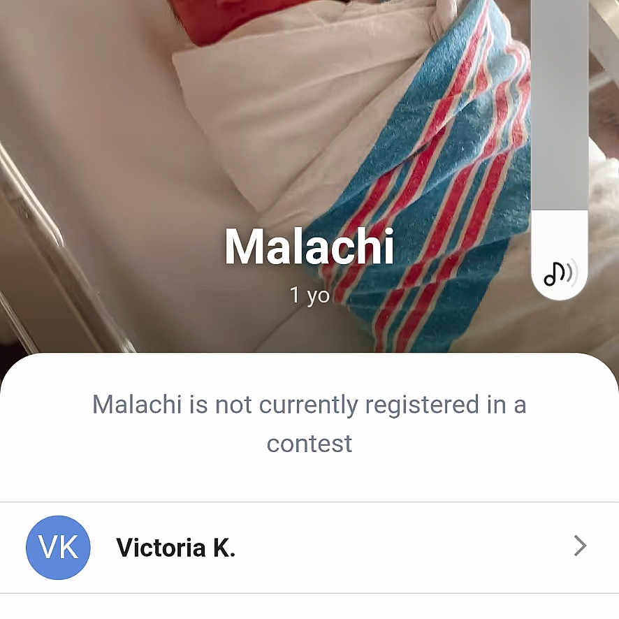 Malachi King joined the competition — help win amazing prizes! architecture, baby, bed, blanket, building, clothing, cradle, electronics, face, furniture, glove, head, hospital, newborn, person, phone, photography, portrait, sleeping, text