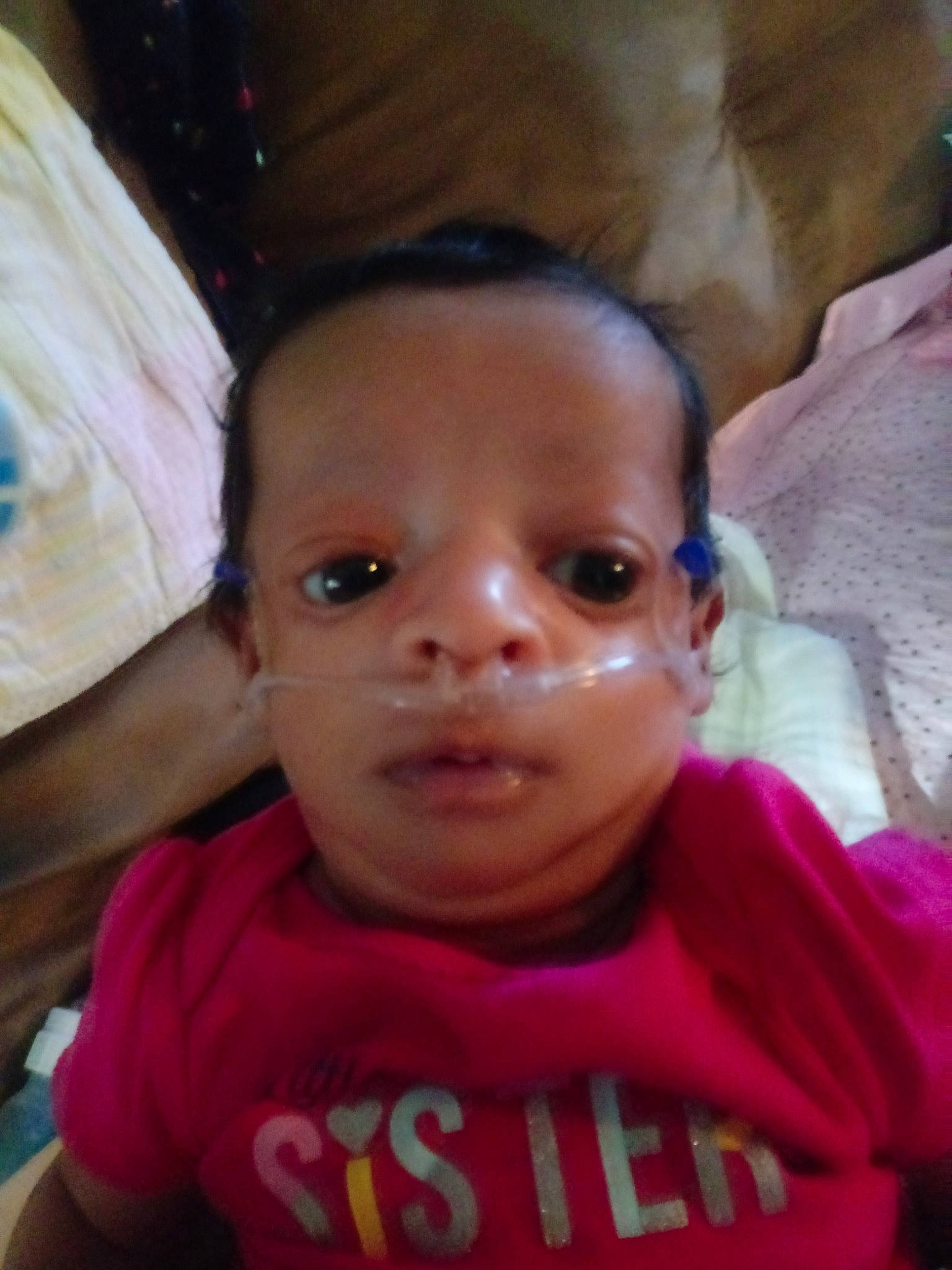 Jerzee is registered to the contest to win money with this photo: baby, cheek, child, ear, eye, eyebrow, face, forehead, fun, head, iris, lip, mouth, nose, person, pink, skin, smile, toddler