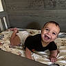 Koa joined the competition — help win amazing prizes! baby, crib, diaper, smiling, happy, infant, winnie_the_pooh, blanket, cartoon_characters, wooden_crib, cute, child, toddler, playful, indoors, portrait, crawling, clothing, person, bedroom