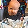 Freyja joined the competition — help win amazing prizes! baby, baby_blanket, blanket, car_seat, child, clothing, colorful, comfort, cozy, cute, face, head, indoor, infant, portrait, resting, smile, stuffed_animal, toy, young