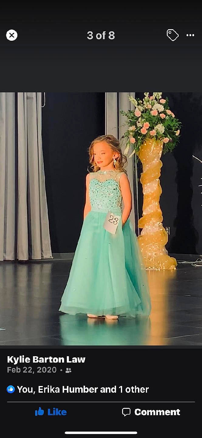 Lexi joined the competition — help win amazing prizes! bridal_party_dress, curtain, day_dress, dress, electric_blue, entertainment, event, fashion_design, flash_photography, flooring, flower, flower_arranging, formal_wear, gown, happy, one_piece_garment, performing_arts, person, textile, waist