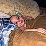 Vanessa is registered to the contest to win money with this photo: baby, smiling, towel, bottle, bed, pillow, blanket, infant, child, happy, face, lying_down, indoors, cute, person, skin, head, hand, cozy, resting