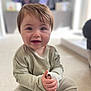 Luca is registered to the contest to win money with this photo: baby, blonde, bodypart, clothing, face, finger, hair, hand, happy, head, laughing, longsleeve, mouth, pants, person, photography, portrait, sitting, sleeve, smile