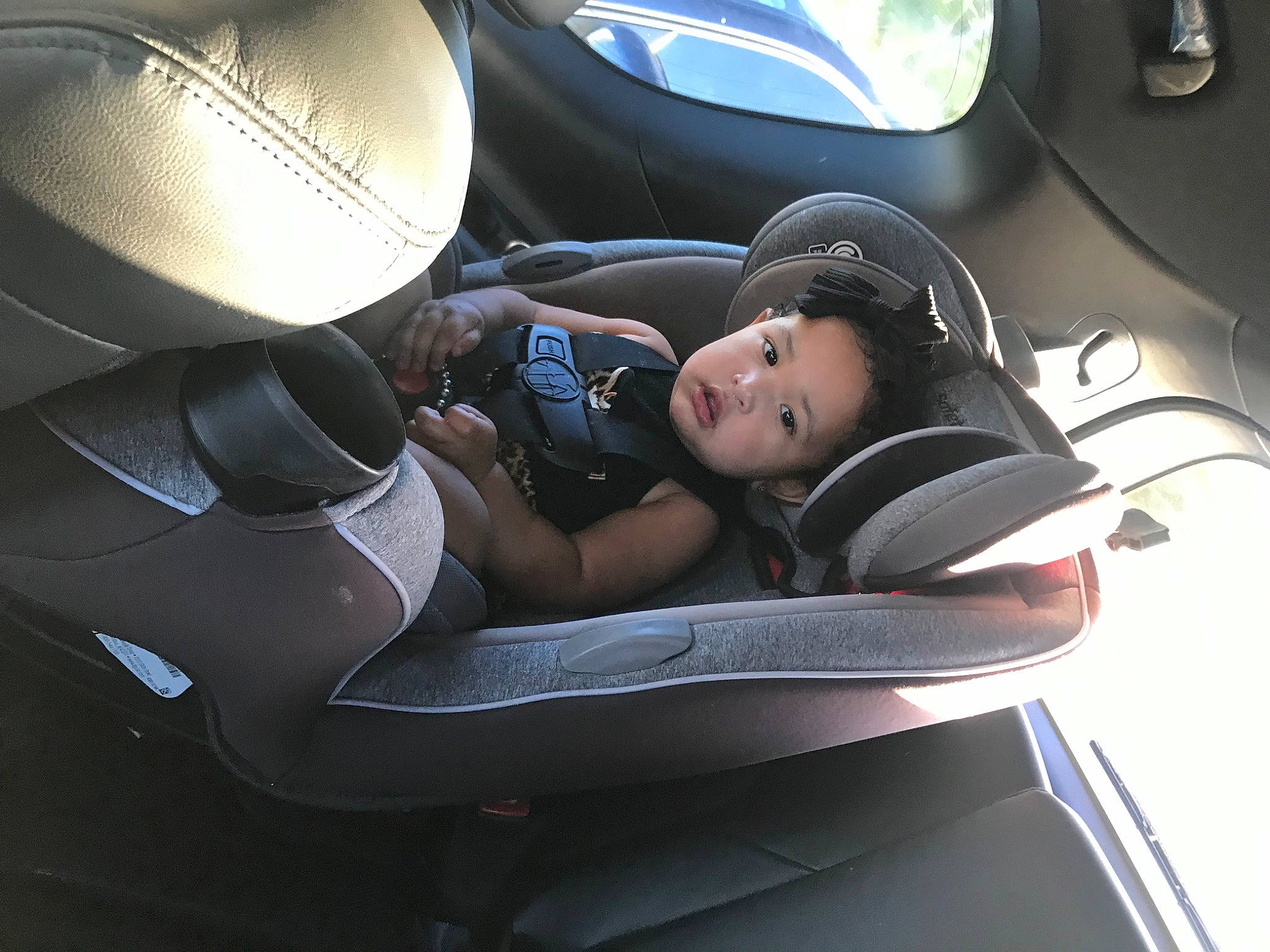 Emily is registered to the contest to win money with this photo: auto_part, automotive_design, automotive_exterior, automotive_lighting, automotive_mirror, automotive_tire, automotive_wheel_system, car, car_seat, car_seat_cover, comfort, head_restraint, helmet, light, motor_vehicle, person, personal_luxury_car, steering_part, steering_wheel, vehicle