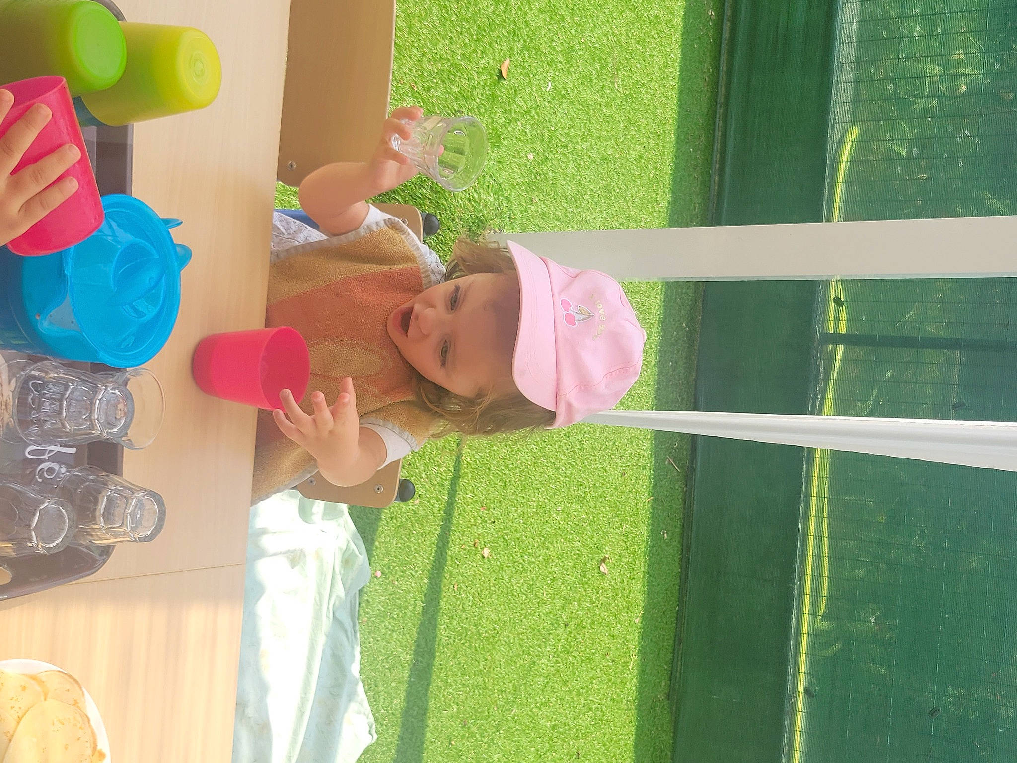 Athènais participe au concours pour gagner de l'argent avec cette photo : baby, baby_products, baby_toys, child, fun, grass, green, happy, hat, leisure, magenta, party_supply, person, plant, plastic, play, room, smile, toddler, toy