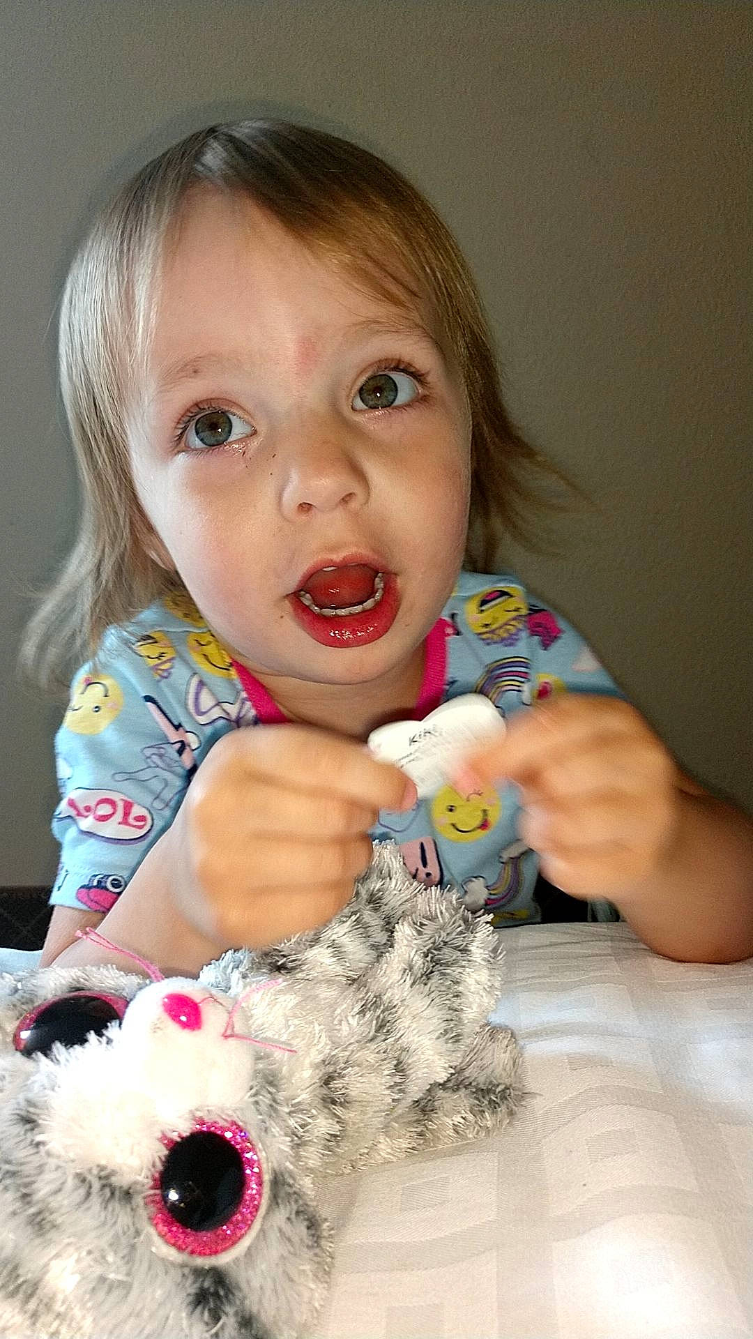 Hartley is registered to the contest to win money with this photo: baby, cheek, child, eye, facial_expression, finger, iris, person, play, smile, surprise, toddler, toy