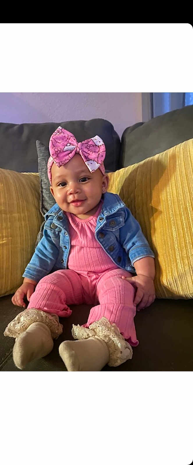 Jream joined the competition — help win amazing prizes! baby, infant, girl, smiling, pink_bow, headband, denim_jacket, pink_outfit, socks, frilly, couch, yellow_cushions, indoor, child, cute, portrait, seated, happy, homedecor, person