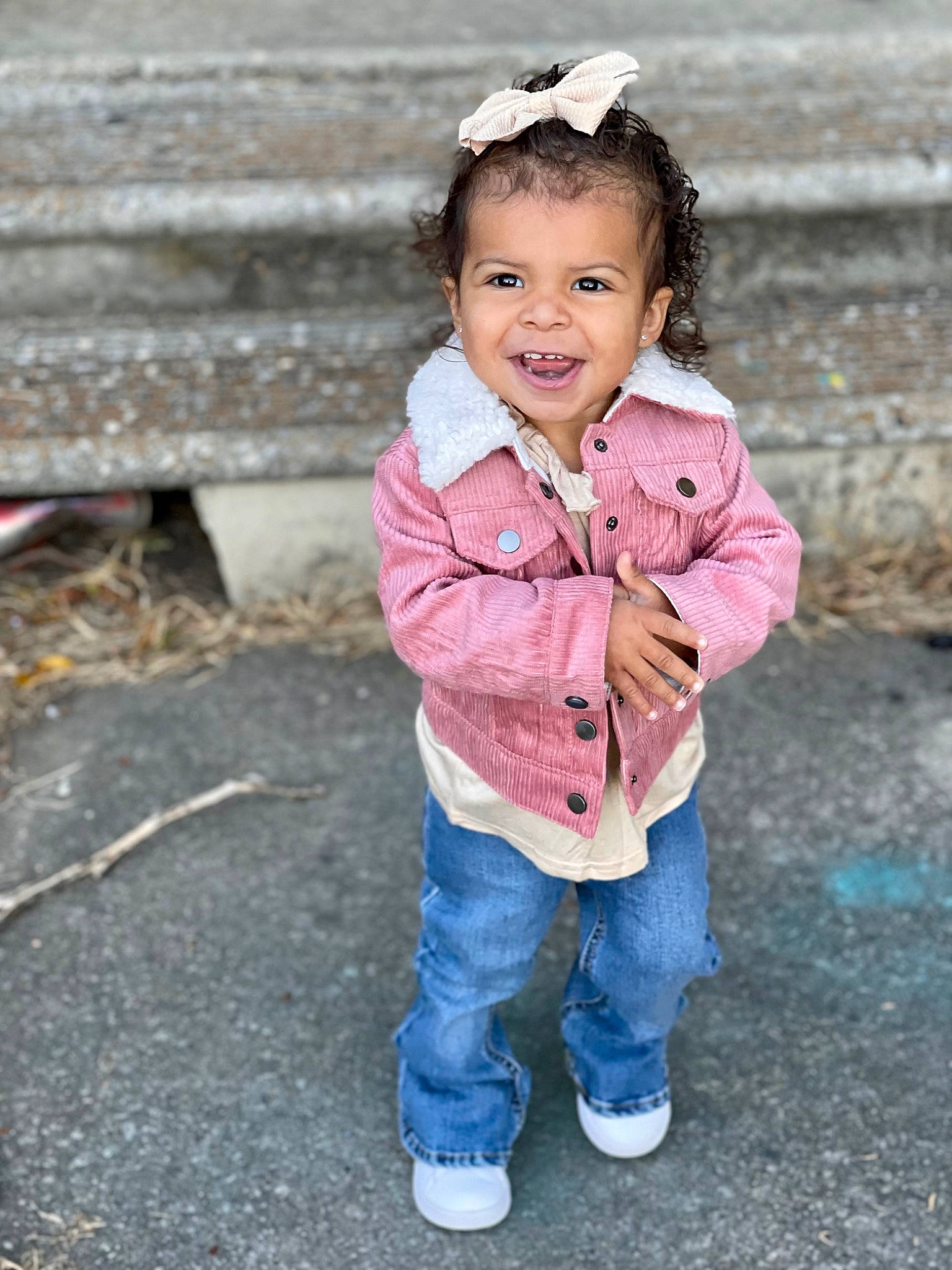 London joined the competition — help win amazing prizes! baby_toddler_clothing, cheek, child, clothing, denim, flash_photography, grass, happy, head, jeans, lip, magenta, people_in_nature, person, sitting, skin, sleeve, smile, standing, toddler