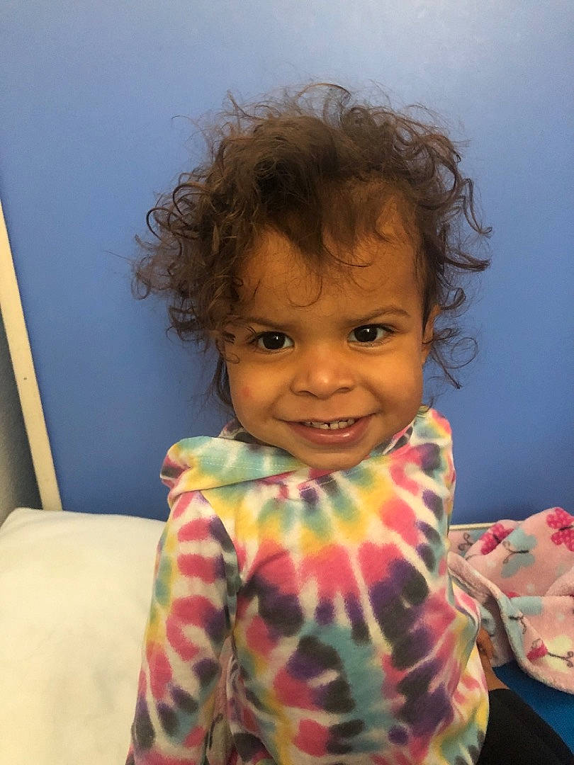 London is registered to the contest to win money with this photo: arm, cheek, chin, comfort, eye, eyebrow, face, hair, happy, human_body, iris, joy, lip, mouth, neck, nose, person, shoulder, skin, sleeve