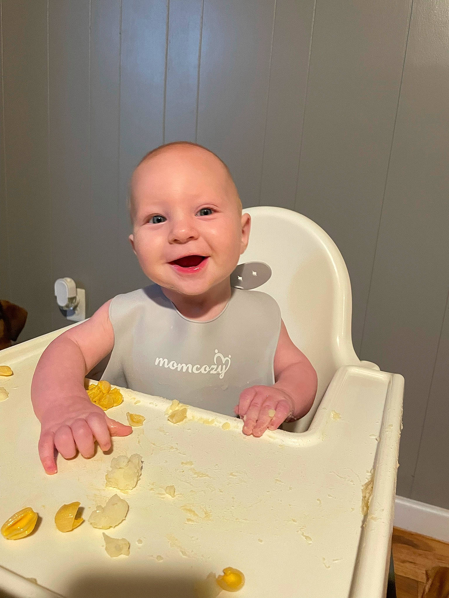 Forrest is registered to the contest to win money with this photo: baby, baby_food, baby_laughing, baby_playing_with_food, baby_products, baby_safety, baby_toddler_clothing, cheek, child, comfort_food, food_craving, fun, happy, person, room, sitting, sleeve, smile, sweetness, t_shirt