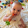Sloane joined the competition — help win amazing prizes! baby, child, toy, chewing, hand, foot, crawling, colorful, infant, playtime, bedspread, white, cute, indoors, person, closeup, smiling, happy, young, exploring