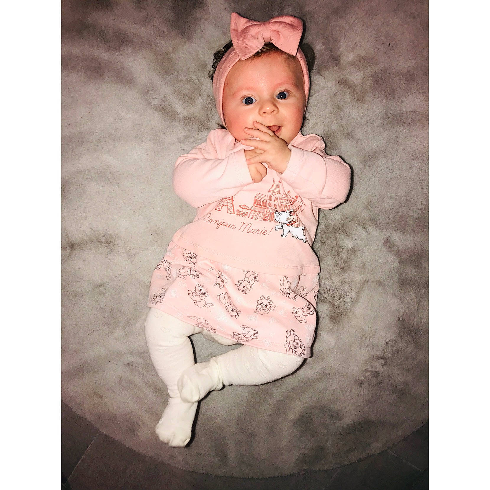 Cléo participe au concours pour gagner de l'argent avec cette photo : baby, baby_products, baby_toddler_clothing, cheek, child, day_dress, headwear, peach, person, pink, skin, toddler