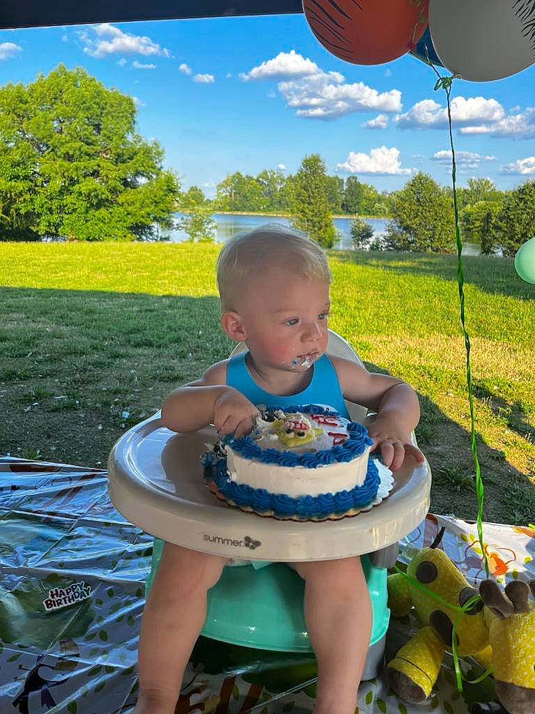 Troy joined the competition — help win amazing prizes! cake, chair, cloud, event, food, fun, grass, green, happy, leisure, nature, outdoor_furniture, person, plate, sky, summer, table, tableware, toddler, tree