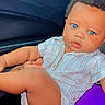 Elijah is registered to the contest to win money with this photo: baby, child, blue_eyes, striped_clothing, romper, car_interior, person_holding, purple_clothing, cute, infant, sitting, portrait, skin, hair, face, young, human, one_person, indoor, car_seat