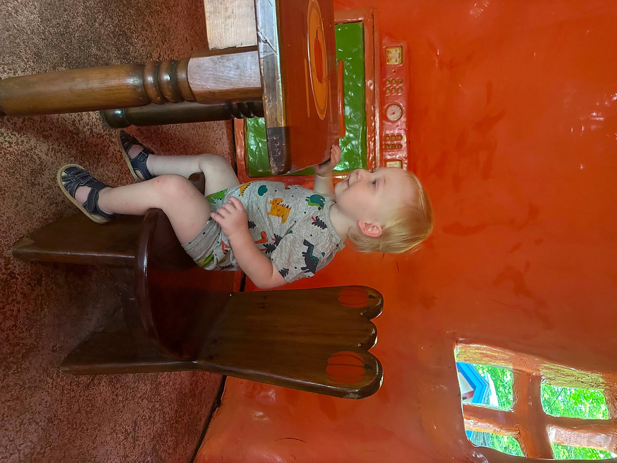 Axton is registered to the contest to win money with this photo: art, baby, child, elbow, fun, hardwood, human_leg, knee, person, room, sitting, thigh, toddler, varnish, wood, wrist