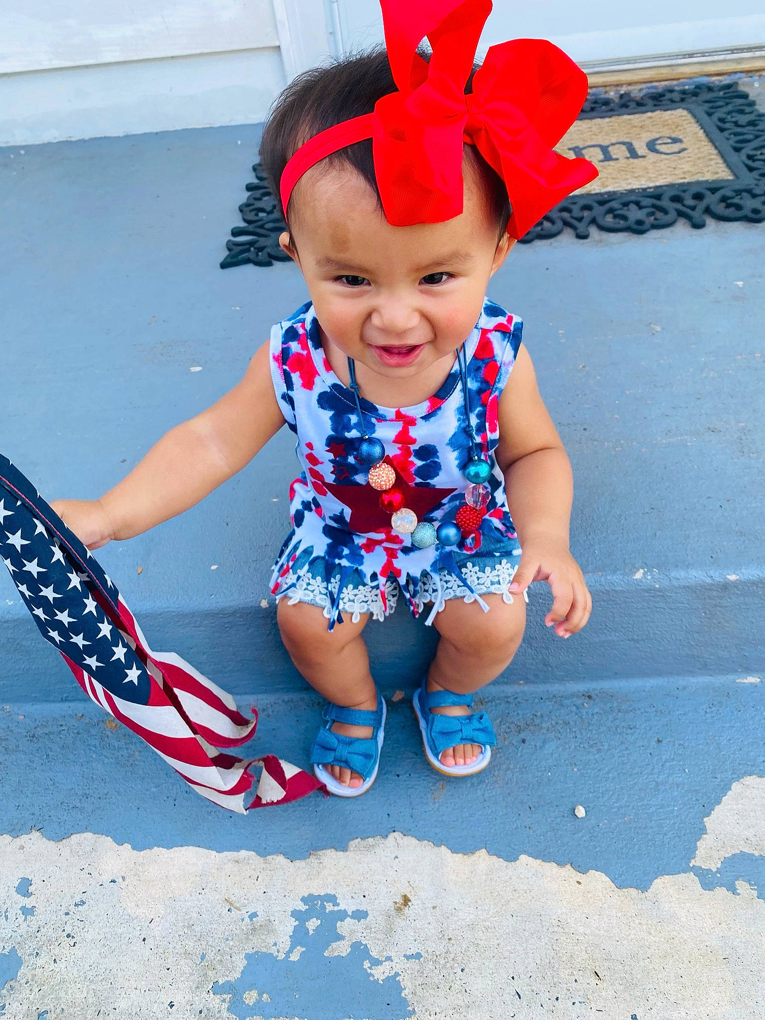 Adriana joined the competition — help win amazing prizes! baby_toddler_clothing, blue, child, costume_hat, electric_blue, fashion_accessory, fictional_character, fun, hair_accessory, happy, headband, headwear, joy, leg, party_supply, pattern, person, pink, red, sitting