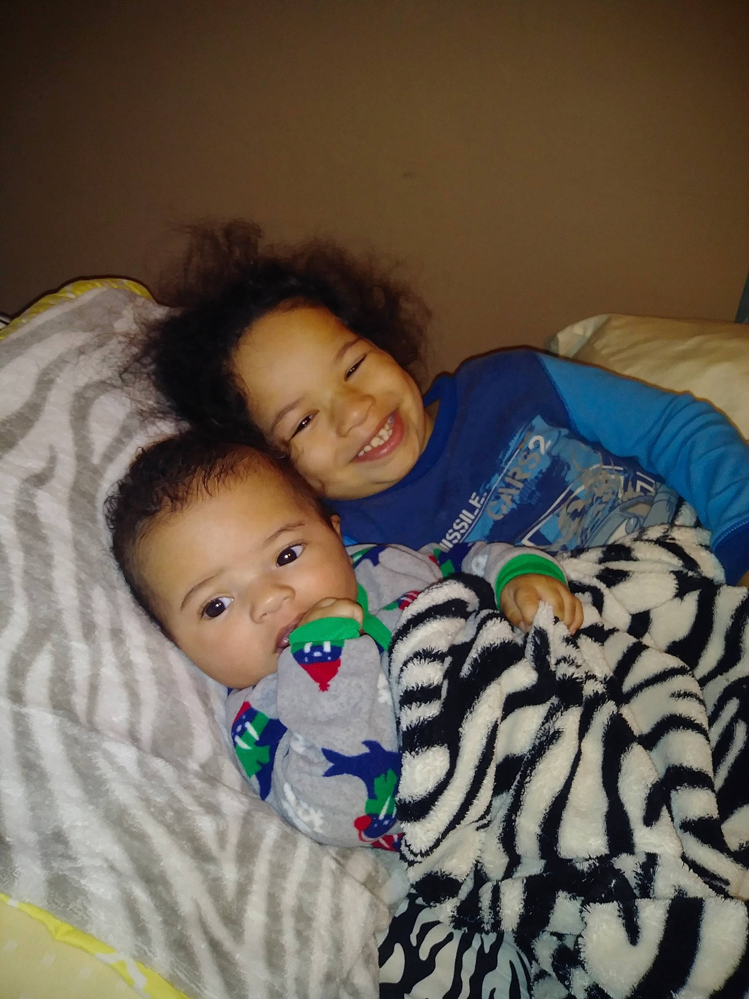 Amory is registered to the contest to win money with this photo: bedtime, boy, child, day, emotion, eye, facial_expression, fun, head, infant, joy, mammal, nose, organ, person, play, product, sitting, skin, smile