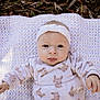 Alice participe au concours pour gagner de l'argent avec cette photo : baby, blanket, bunny_print, child, clothing, cute, expression, face, grass, headband, infant, leaves, long_sleeve, lying_down, nature, outdoor, person, portrait, soft_texture, tongue