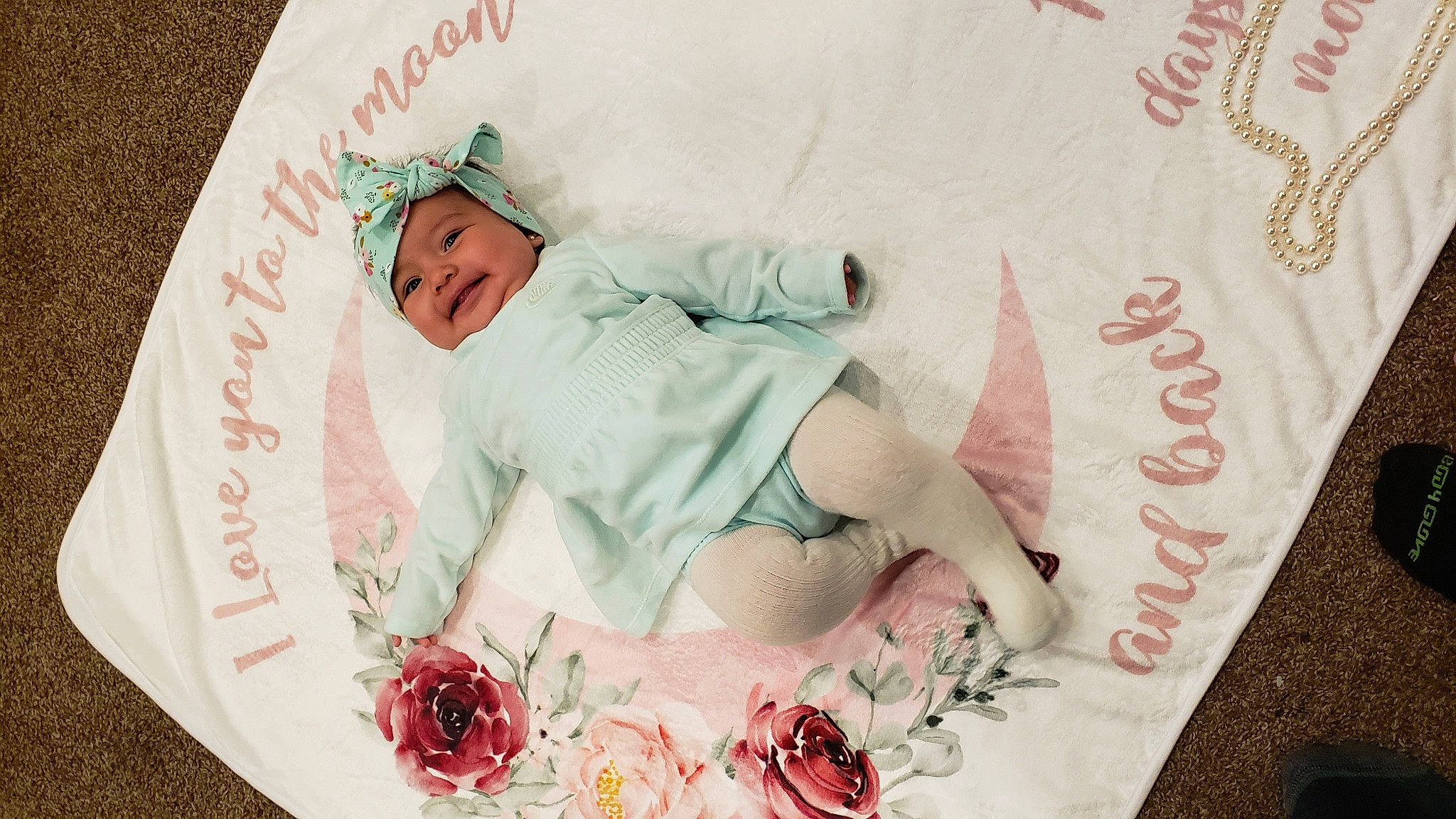 Shayla joined the competition — help win amazing prizes! baby, baby_toddler_clothing, carmine, child, font, happy, hat, headwear, linens, magenta, paper, paper_product, pattern, peach, person, petal, pink, room, sleeve, textile