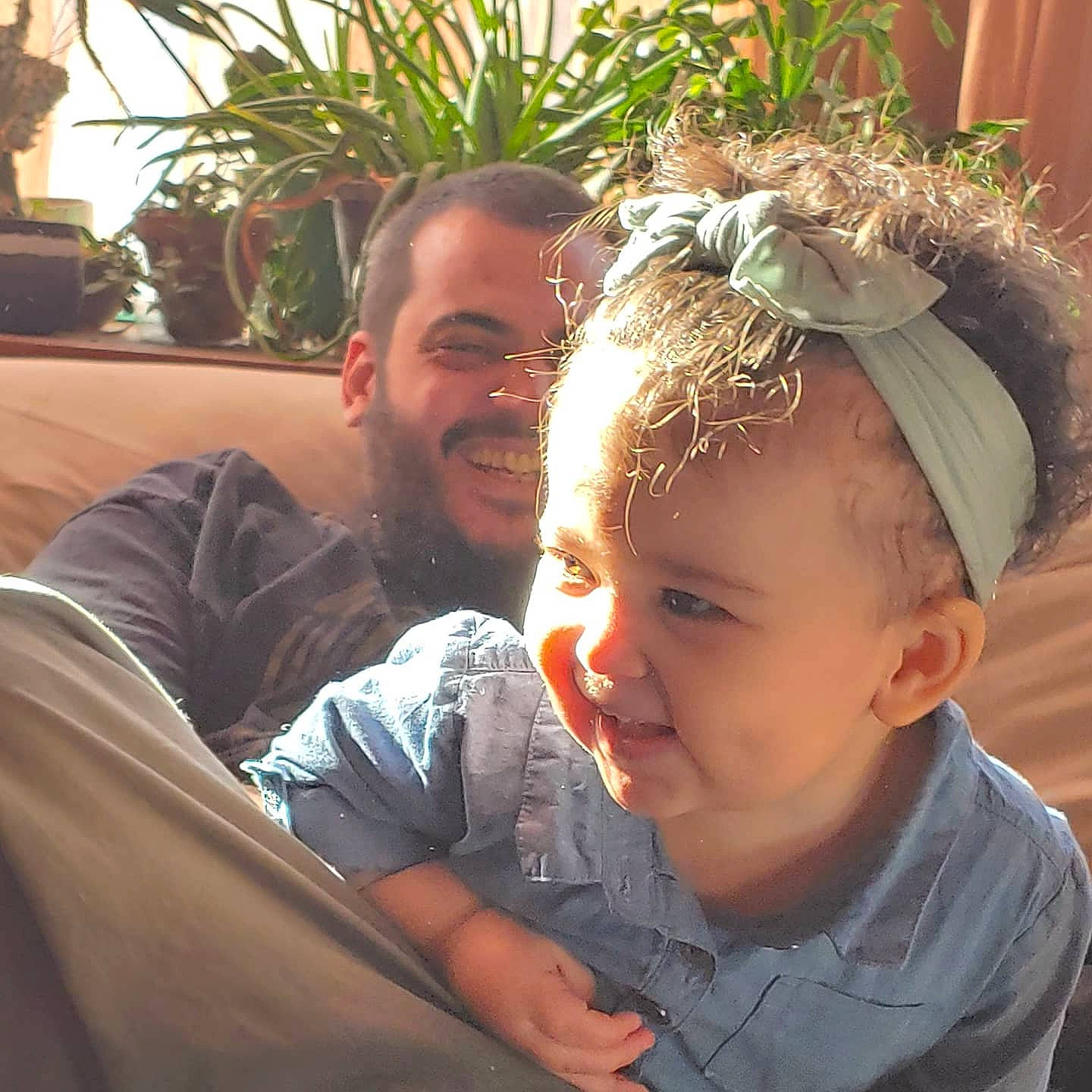 Edith is registered to the contest to win money with this photo: comfort, cool, eye, facial_expression, flowerpot, grass, happy, houseplant, human, joy, mammal, morning, organ, people, people_in_nature, person, photograph, plant, skin, smile