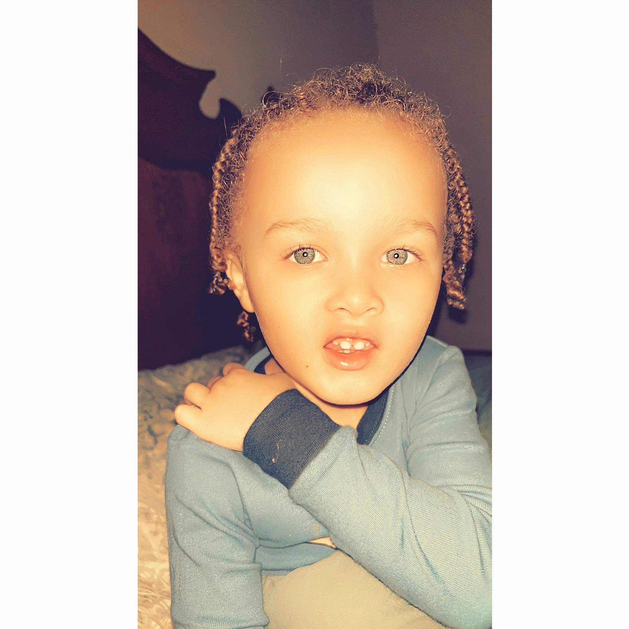 Isaiah is registered to the contest to win money with this photo: arm, black_hair, cheek, cloud, ear, eyebrow, eyelash, fashion_accessory, flash_photography, hair, happy, head, headgear, iris, jaw, lip, long_hair, nose, person, sleeve