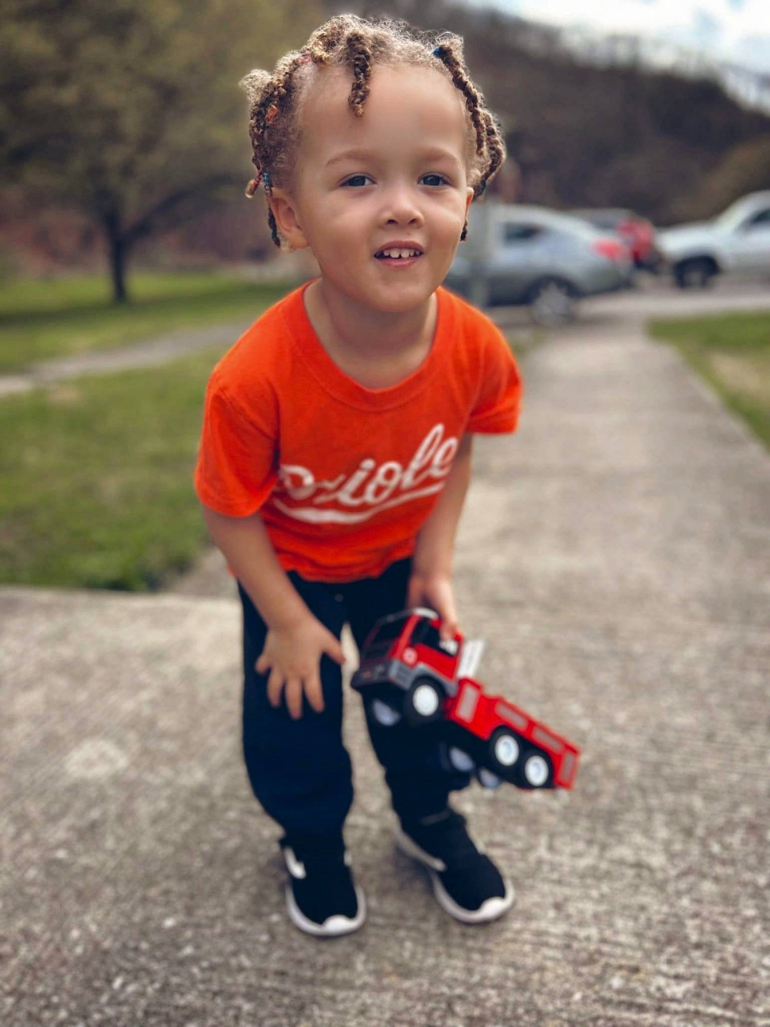 Isaiah is registered to the contest to win money with this photo: asphalt, baby, carmine, child, cool, electric_blue, eye, face, flash_photography, fun, grass, happy, head, joy, leisure, lip, person, recreation, smile, t_shirt