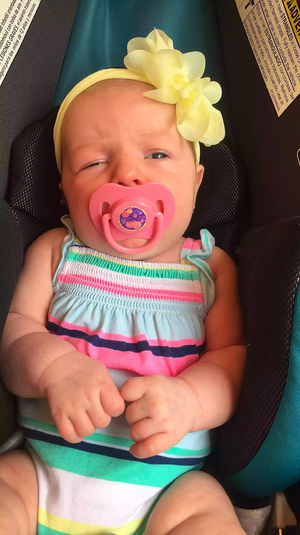 Carleigh is registered to the contest to win money with this photo: baby, baby_in_car_seat, baby_laughing, baby_products, baby_toddler_clothing, cheek, child, facial_expression, mouth, person, product, smile, toddler