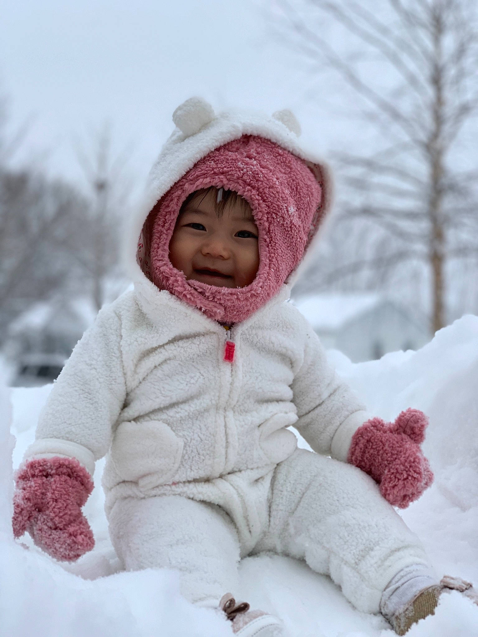 Karissa joined the competition — help win amazing prizes! baby, bonnet, cheek, child, freezing, fur, headgear, headwear, hood, knit_cap, outerwear, person, pink, playing_in_the_snow, skin, smile, snow, toddler, white, winter