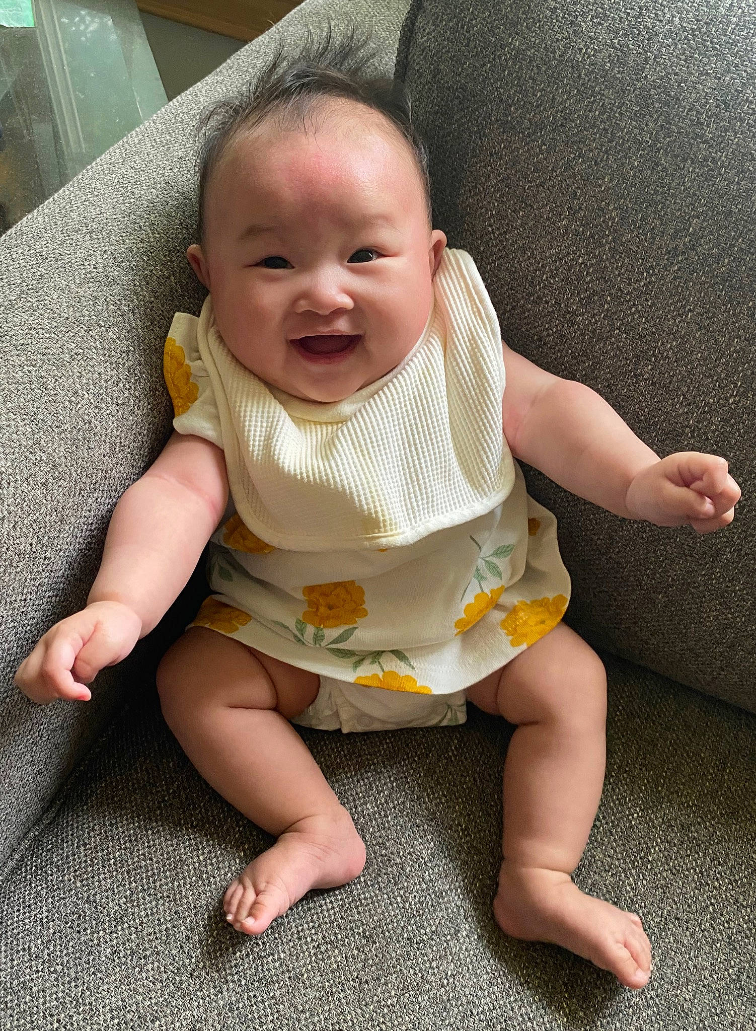 Mamie joined the competition — help win amazing prizes! baby, baby_toddler_clothing, cheek, chin, comfort, eye, face, finger, grass, head, human_body, iris, leg, mouth, nose, person, skin, sleeve, smile, thumb