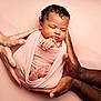Sienna is registered to the contest to win money with this photo: baby, blanket, care, closeup, cute, diversity, family, hands, infant, love, newborn, peaceful, pink, portrait, skin, sleeping, soft, studio, tenderness, wrapped