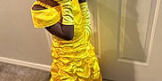 Nayauni is registered to the contest to win money with this photo: child, girl, princess, yellow_dress, tiara, gloves, posing, indoor, door, shadow, carpet, floor, costume, fashion, portrait, smiling, cute, young, celebration, dress_up