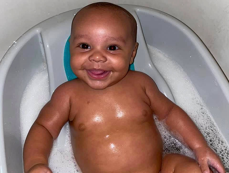 Ronnell joined the competition — help win amazing prizes! baby_bathing, bathing, bathroom, bathtub, cheek, chin, eye, eyebrow, fluid, iris, jaw, joy, mouth, nose, organ, person, product, skin, smile, toddler