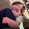 Harvee joined the competition — help win amazing prizes! baby, child, infant, portrait, wide_eyes, curly_hair, cuddling, hugging, adult, arm, tattoo, blanket, bed, indoor, home, close_up, looking_at_camera, short_sleeves, cozy, family