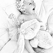 Victoria participe au concours pour gagner de l'argent avec cette photo : baby, infant, polka_dot, bow, stuffed_animal, plush_toy, tufted_cushion, yawning, black_and_white, cute, sleepy, soft_texture, child, adorable, resting, clothing, foot, hand, portrait, indoor