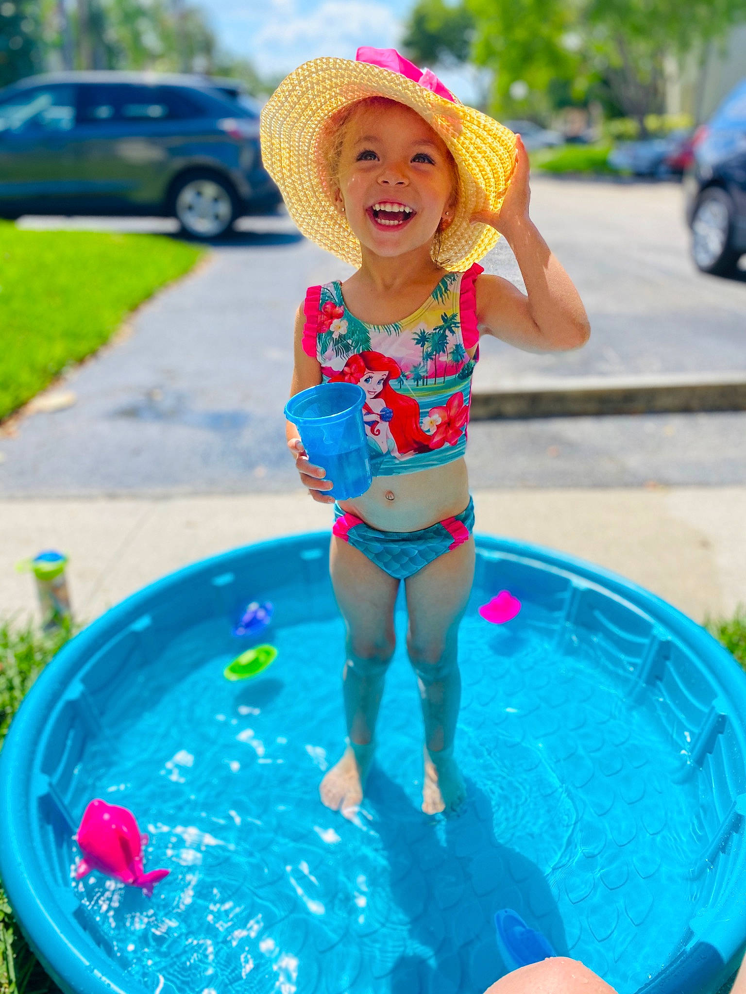 Kaydence is registered to the contest to win money with this photo: child, fun, games, leisure, person, play, recreation, summer, sun_hat, swimming_pool, swimwear, toddler, toy, vacation, water