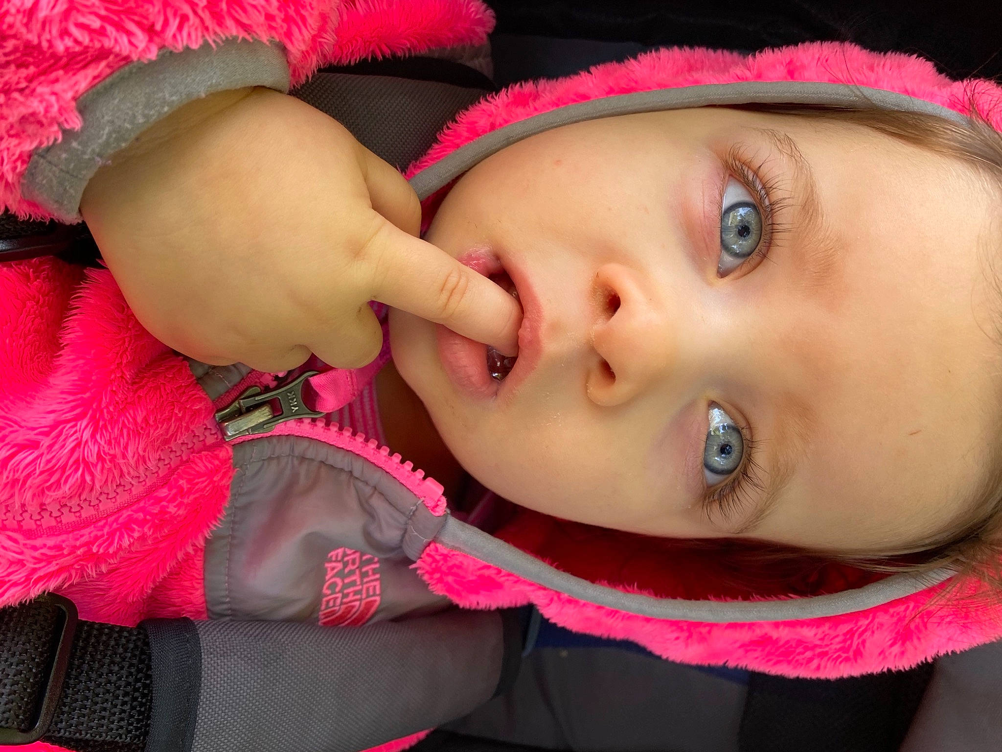 Josephine is registered to the contest to win money with this photo: black_hair, cap, cheek, child, close_up, cool, eyebrow, eyelash, flash_photography, happy, iris, lip, magenta, mouth, neck, nose, person, pink, skin, textile