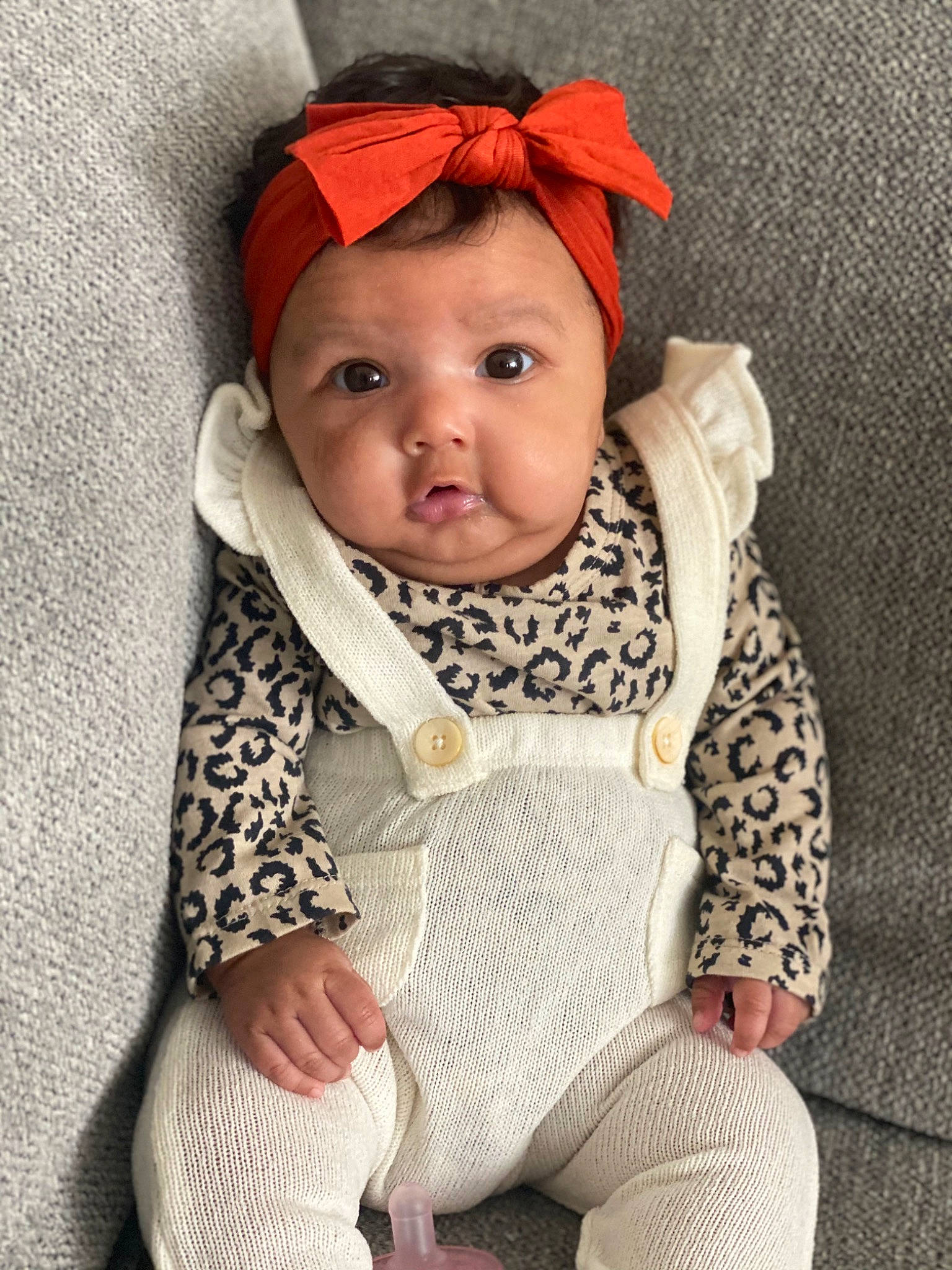 Aylah is registered to the contest to win money with this photo: baby, baby_toddler_clothing, cap, cheek, collar, comfort, eye, face, head, headgear, headwear, human_body, iris, jacket, lip, outerwear, person, skin, sleeve, textile