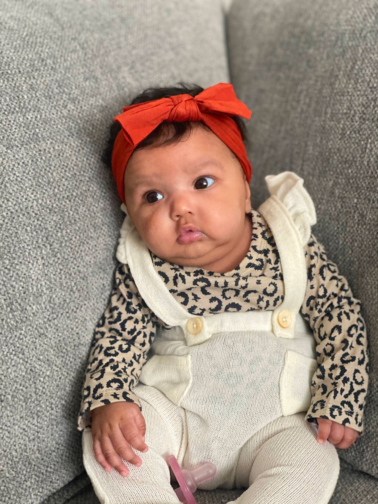 Aylah joined the competition — help win amazing prizes! baby, baby_carriage, baby_products, baby_toddler_clothing, cap, cheek, chin, comfort, eye, head, headwear, human_body, iris, lip, mouth, nose, outerwear, person, skin, sleeve