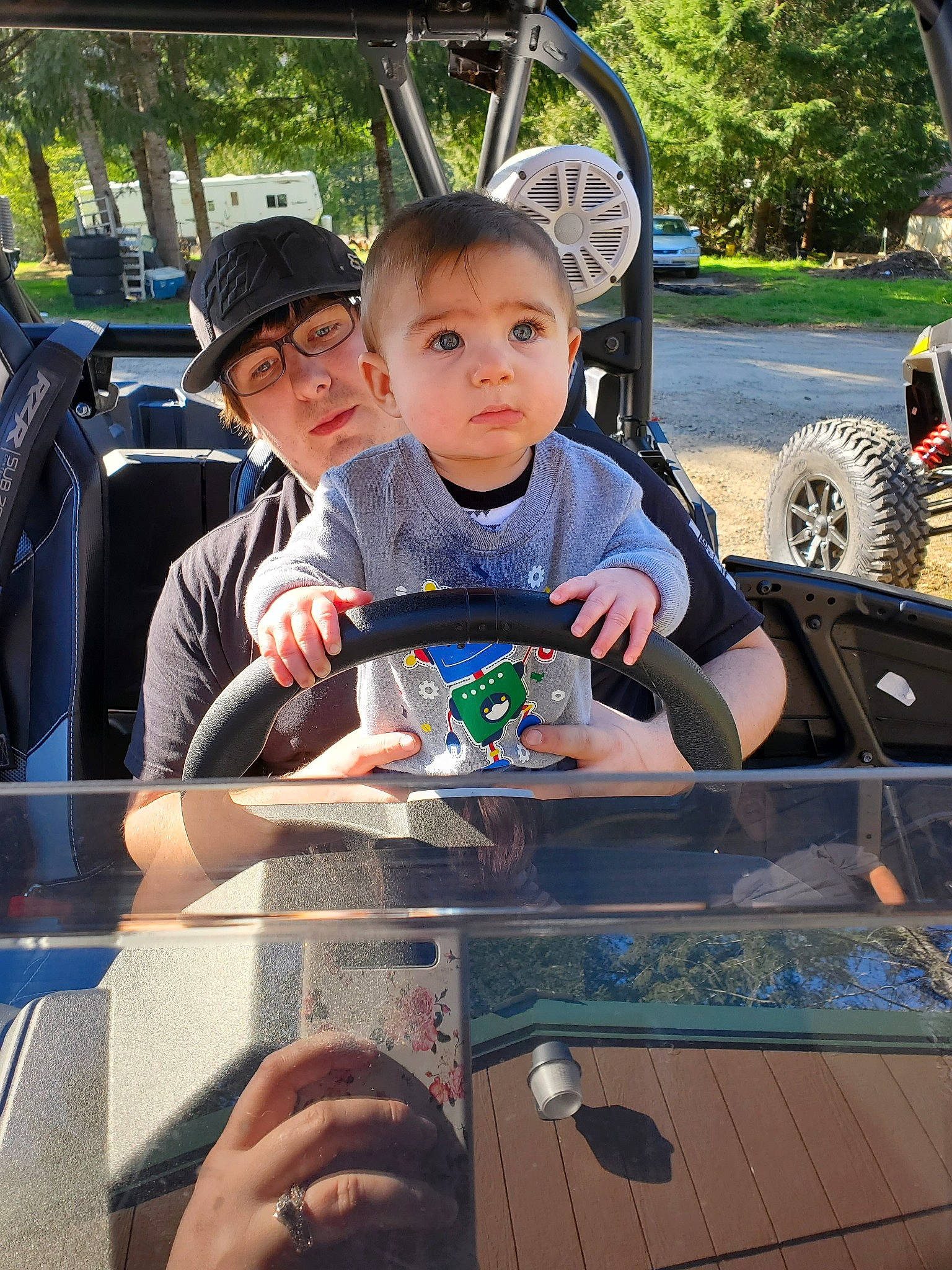 Ricky joined the competition — help win amazing prizes! automotive_window_part, car, child, glass, hand, headwear, person, toddler, vacation, vehicle