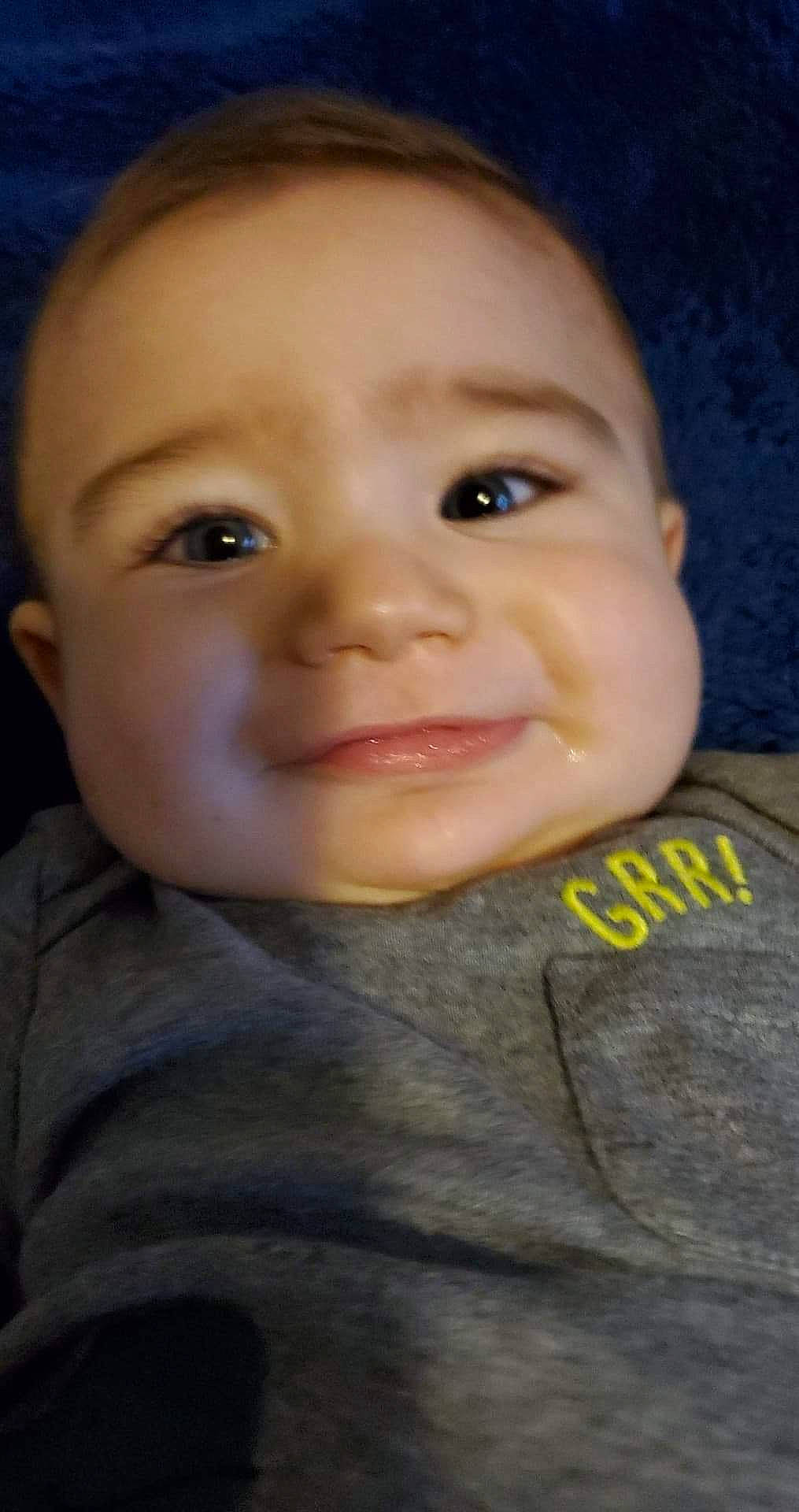 Ricky is registered to the contest to win money with this photo: baby, cheek, child, chin, close_up, ear, eye, eyebrow, face, facial_expression, forehead, head, iris, joy, lip, mouth, nose, person, portrait, skin