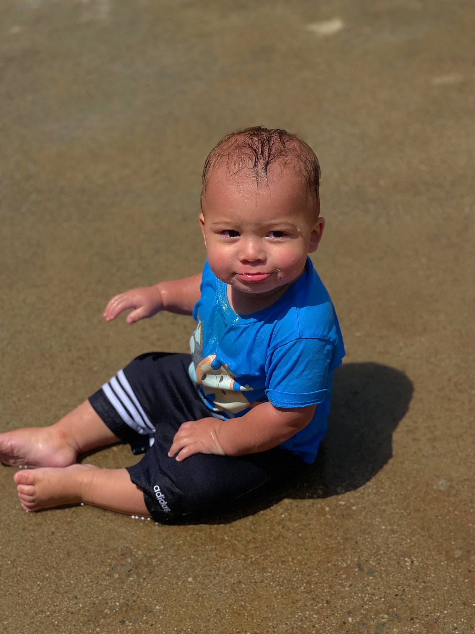 Ruben joined the competition — help win amazing prizes! baby, baby_toddler_clothing, barefoot, elbow, electric_blue, eye, flooring, foot, grass, happy, human_leg, knee, leisure, people_in_nature, person, sand, sleeve, t_shirt, toddler, water