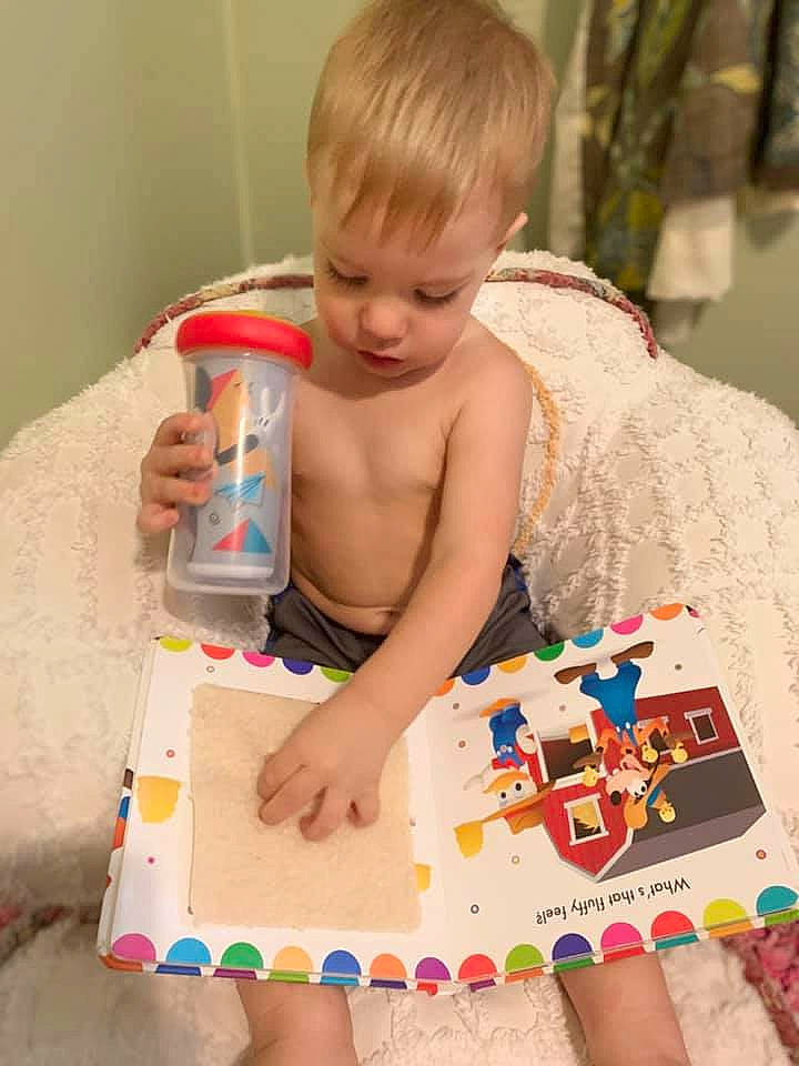 Elijah is registered to the contest to win money with this photo: baby, baby_toddler_clothing, child, pattern, person, play, sitting, toddler, toy