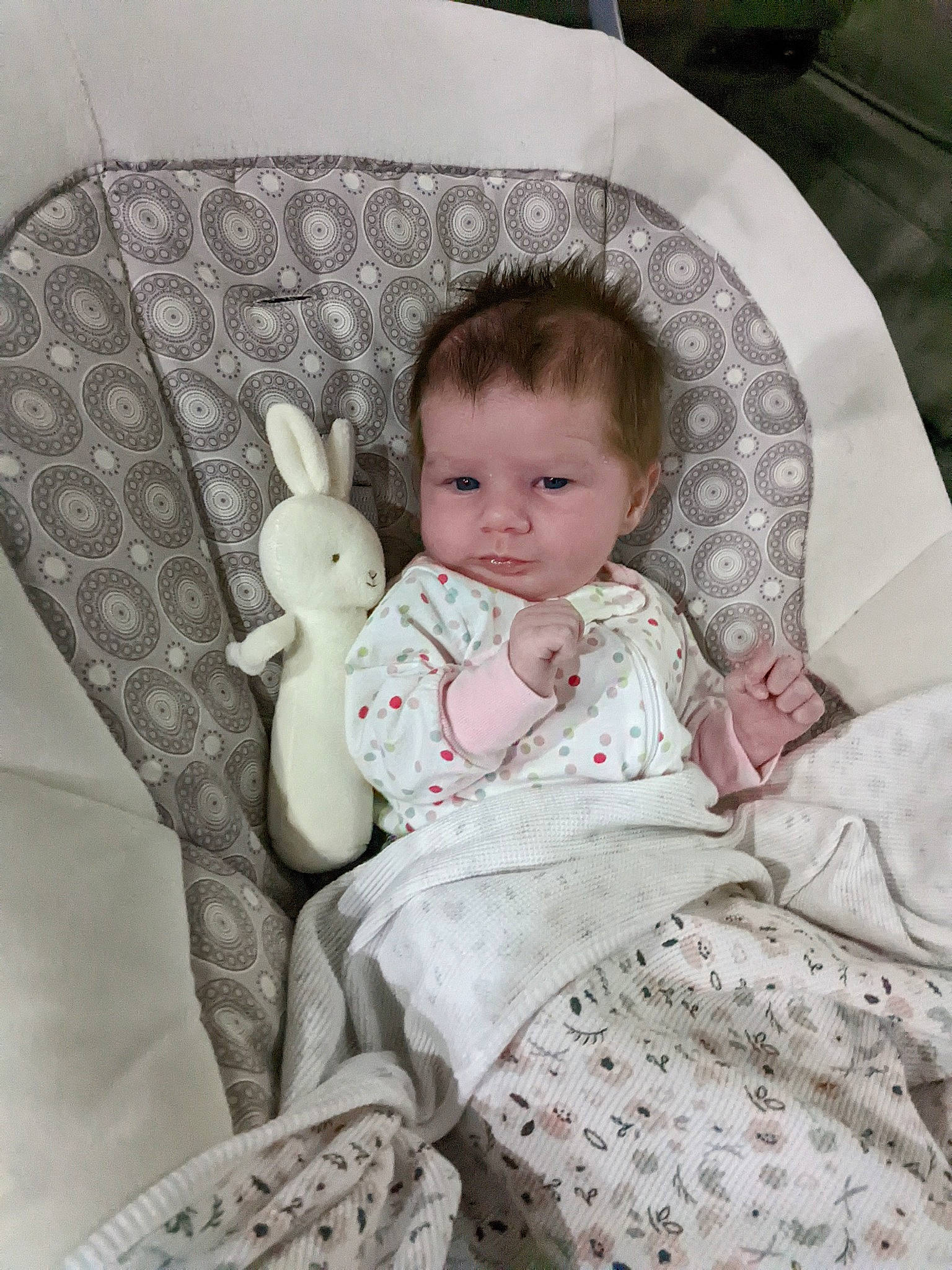 Harper joined the competition — help win amazing prizes! baby, baby_products, baby_toddler_clothing, chair, cheek, child, comfort, couch, eye, fashion_accessory, hairstyle, infant_bed, linens, pattern, person, room, sitting, skin, sleeve, toddler