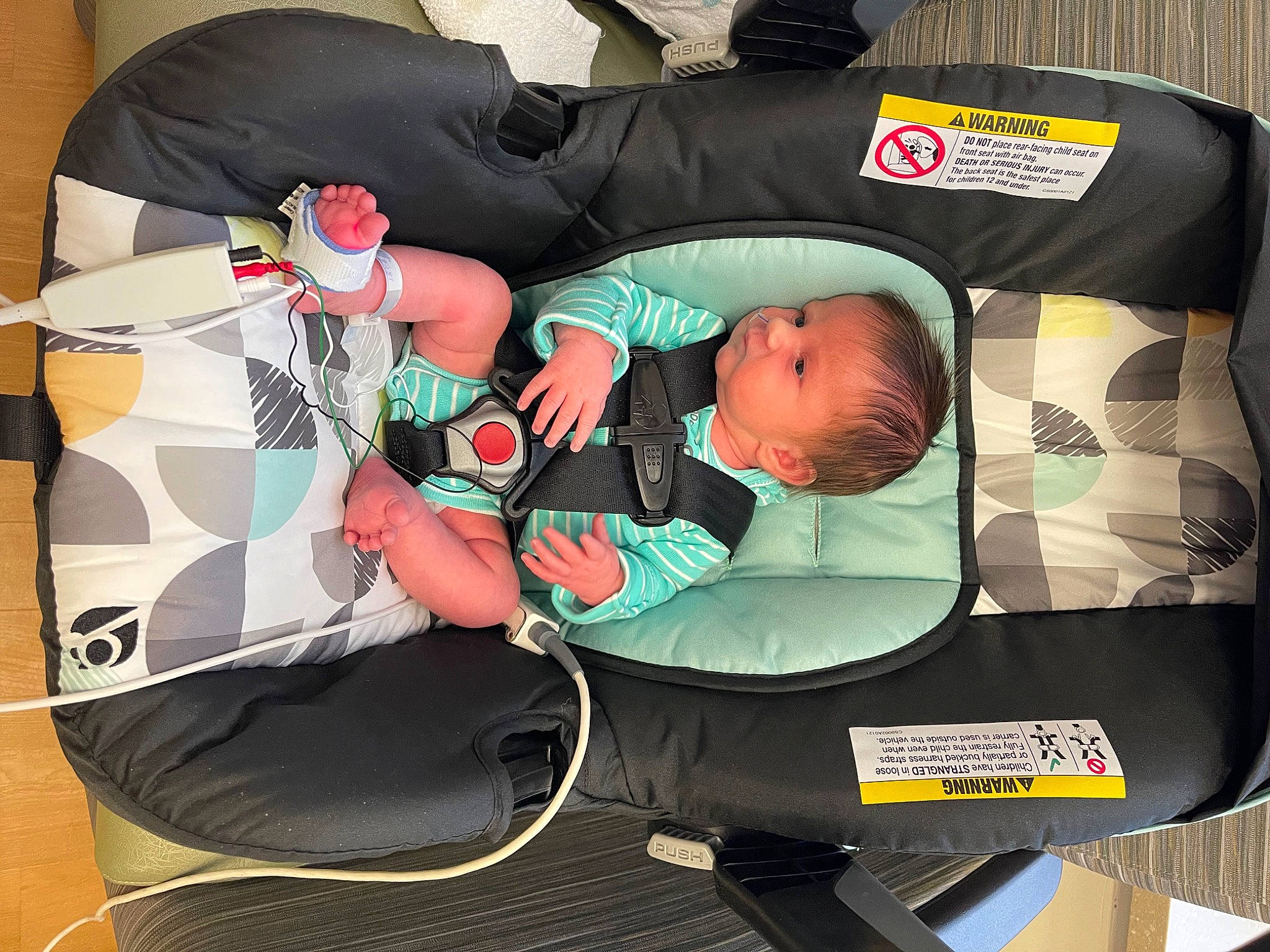 Adrian joined the competition — help win amazing prizes! baby, baby_carriage, baby_products, baby_safety, baby_toddler_clothing, bag, car_seat, carmine, child, comfort, green, lap, luggage_and_bags, person, sitting, toddler, vertebrate