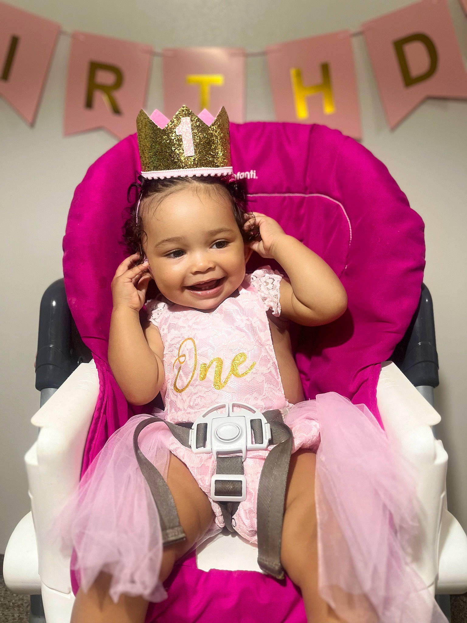 Layla is registered to the contest to win money with this photo: baby, baby_toddler_clothing, comfort, costume_hat, crown, event, fashion_accessory, fun, happy, hat, headpiece, jewellery, joy, lap, magenta, party_supply, person, pink, purple, smile